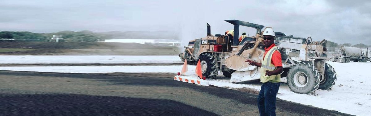 Road construction crew and machinery